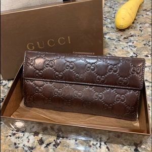 Gucci Guccissma wallet. logo GG used